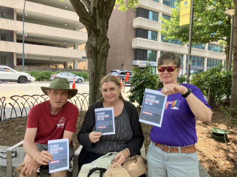 Indivisible Guilford County NC is spreading the word on the MAGA Default Crisis in downtown Greensboro.