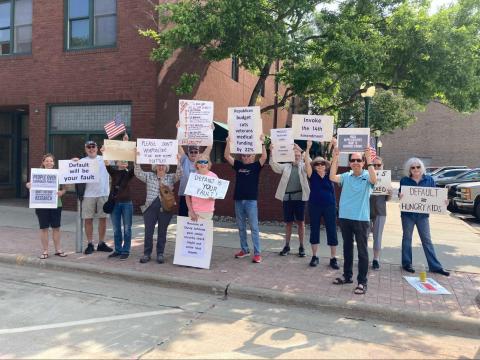 Indivisibles in Sioux Falls, SD protested in front of Sioux Falls offices of South Dakota congressional Republicans.