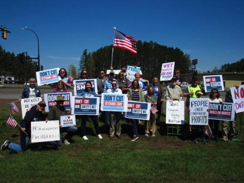 Indivisible Itasca Area located in Northland at rally calling out Republican Rep. Pete Stauber (MN-08) for pushing our country closer to default. 