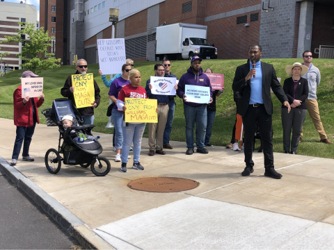Indivisible Onondaga County hold coordinated signs to put pressure on the freshman Republican Rep. Brandon Williams’s (NY-22) to support a clean debt ceiling hike. Local activists and SEIU members also rallied against the GOP’s efforts to cut benefits.